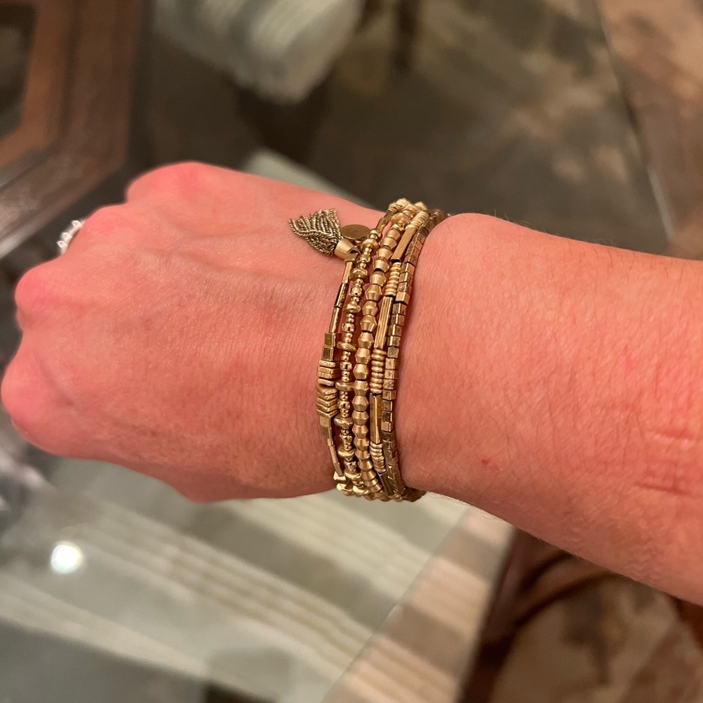 Stella & Dot gold tone wrap bracelet with tassels
